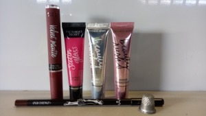 58 PIECE BRAND NEW ASSORTED MAKEUP LOT CONTAINING VICTORIAS SECRET SHIMMER FLAVOURED GLOSS, VELVET MATTE CREAM LIP STAIN, FLAVOURED LIP SHINE AND NYX LIP PENCIL - IN 5 BOXES