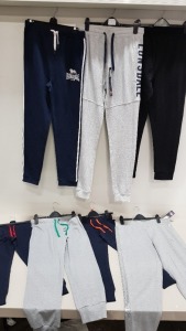 14 PIECE MIXED LONSDALE LADIES LOT CONTAINING JOGGING BOTTOMS IN VARIOUS STYLES, COLOURS AND SIZES