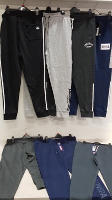 9 PIECE MIXED LONSDALE MENS LOT CONTAINING JOGGING BOTTOMS IN VARIOUS STYLES, COLOURS AND SIZES