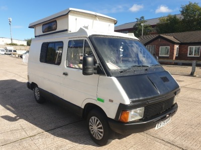 WHITE RENAULT TRAFIC AS CAMPER. Reg : E979 NHN, Mileage : 119,772 Details: 2 KEYS MOT 13/4 /22 WITH V5 BUT NO TRADER PART, POP UP ROOF, 4 BERTH CAMPER VAN, 2 HAMMOCK BEDS, 2 FOLD DOWN DRIVERS/PASSENGER SEAT BEDS, FELLOWS 2 RING GAS HOB & GRILL, ELECTROLU