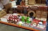 LARGE QUANTITY ASSORTED CHRISTMAS LOT CONTAINING 12 CRAFT MAKES OF CHRISTMAS, SINGING DANCING DOGS, CHRISTMAS CARDS, PERSONLISE YOUR OWN CRACKERS, CHRISTMAS CRACKERS PROPS, VARIOUS BOOKS, LARGE CHRISTMAS SHOPPING BAGS, RIBBONS, SANTA SNOOP ALARM, VARIOUS