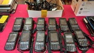 23 X HONEYWELL DOLPHIN 6000 HANDHELD DEVICES IN BLACK WITH 3.0 MEGA PIXEL CAMERA 7 X WITH VEHICLE CHARGERS PLEASE NOTE - ONLY 7 X CHARGERS/HAVE NOT BEEN CHECKED/VISUALLY LOOK TO BE IN AVERAGE CONDITION