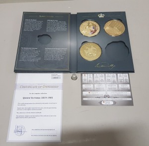 PART COLLECTION OF 3 LARGE COMMEMORATIVE COINS QUEEN VICTORIA 1819 - 1901 (161-479-1) COMPLETE WITH CERTIFICATE OF OWNERSHIP NO. Z0542. CONTAINED IN A PRESENTATION FOLDER