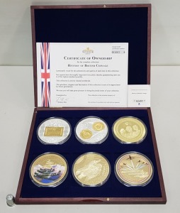 SET OF 6 COMMEMORATIVE COINS CU SILVER PLATED WITH SPOT GOLD HISTORY OF BRITISH COINAGE COMPLETE WITH CERTIFICATE OF OWNERSHIP NO 001663. CONTAINED WITHIN A ROSEWOOD COLOURED WOODEN PRESENTATION CASE