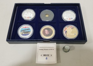 SET OF 6 VARIOUS COMMEMORATIVE COPPER COINS, SILVER PLATED WITH SPOT GOLD. CONTAINED WITHIN A BLUE PRESENTATION BOX
