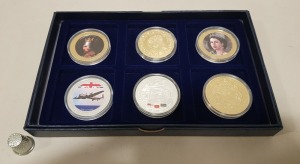 SET OF 6 VARIOUS COMMEMORATIVE COPPER COINS, SILVER & GOLD PLATED. CONTAINED WITHIN A BLUE PRESENTATION BOX