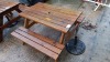 WOODEN BENCH WITH A PARASOL STAND