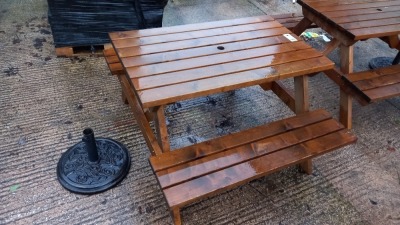 WOODEN BENCH WITH A PARASOL STAND
