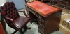 1 X WOODEN DESK WITH 9 LOCKABLE DRAWERS WITH RED TOP ( COMES WITH 2 KEYS ) SLIGHT DAMAGE ON BOTH SIDES OF DRAWERS , ALSO COMES WITH MATCHING COLOURED PADDED WOODEN CHAIR WITH WHEELS