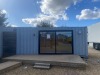 CONVERTED CONTAINER 2 - BREAK ROOM - 20 FT STANDARD HEIGHT FULL SHOWER ROOM TO INCLUDE SHOWER CUBICAL WC AND WASH HAND BASIN (BASIN HAS A INTERNAL HOT WATER HEATER) FULL KITCHENETTE WITH COMBI MICROWAVE UNDER COUNTER FRIDGE WITH SOLID STATE COUNTERTOP WIT - 2