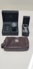 3 PIECE WATCH LOT CONTAINING BLACK ARMANI EXCHANGE WATCH IN BOX AND SEKONDA WATCH IN BOX AND MOLTEN BROWN LONDON AIR LINE BAG