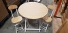 2 X OAK COLOURED ROUND TABLES DIAMETER 80CM AND 4 X OAK FOLDABLE CHAIRS (NOTE: FACTORY GRADED SOME VENEER LIFTING, SCUFFS OR SCRATCHES)