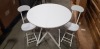 2 X WHITE ROUND TABLES DIAMETER 80CM AND 4 X WHITE FOLDABLE CHAIRS (NOTE: FACTORY GRADED SOME VENEER LIFTING, SCUFFS OR SCRATCHES)