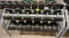 1 X USED DUMBBELLS RACK COMES WITH 6 SETS OF DUMBBELLS WITH PLASTIC WEIGHTS AND ROTATING HANDLES COMES IN WEIGHTS RANGING FROM ( 4KG , 6KG , 8KG , 10KG, 12KG , AND 14KG DUMBBELLS )