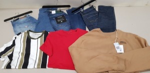 11 PIECE MIXED GUESS CLOTHING LOT CONTAINING JUMPERS IN KHAKI AND ORANGE, T SHIRTS IN VARIOUS STYLES AND SIZES AND GUESS JEANS ETC