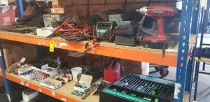2 FULL SHELFS TO INCLUDE VARIOUS LIGHT BULBS , BOOT CAR JACKS , WHEEL BALANCING WEIGHTS , PETROL TANK 5L , CLARKE 24V IMPACT GUN WITH CHARGER AND BATTERY , TOOL BOX WITH ASSORTED TOOLS , VACUUM CLEANER , CAR JUMP LEADS , AND CAR BATTERY CHARGER ETC