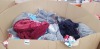 FULL PALET OF CLOTHING CONTAINING BIKINI BOTTOMS, BIKINI TOPS, QUARTER ZIP HOODED JUMPERS AND FUR CARDIGAN ETC