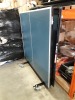 1 X TABLE TENNIS TABLE - CARLTON GT 2000 - 15MM PLAYING SURFACE ,FOLDABLE AND EASILY MOVABLE WITH 8 WHEELS , COMES WITH RACHETS AND NETTING - PLEASE NOTE SLIGHT DAMAGE ON SIDE OF BOARD - PLEASE NOTE THIS IS CUSTOMER RETURN