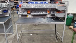 1 X INDUSTRIAL WORK BENCH WITH 2 DOUBLE SOCKETS AND HANGING TRAYS SOME CONTAINING VARIOUS MACHINE PARTS. OVERALL DIMENSIONS 180x80x155cm