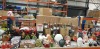 FULL BAY CONTAINING CHRISTMAS BOOKS, MAGICAL DECS WTH LED LIGHTS , CHRISTMAS ORNAMENTS, PUMPABLE MINI WATER FOUNTAINS, PRICES PATENT CANDLES, BASKETS AND PLUGS ETC
