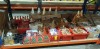 FULL BAY CONTAINING CHRISTMAS DECORATIONS, MASON JARS, CHRISTMAS BOOKS, LIGHTS AND LED ACRYLIC PENGUINS ETC