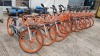 10 X ORANGE & SILVER CITY CAMPING BICYCLES - TRADE LOT - ROBUST ALUMINIUM 19 X 48 FRAME, SOLID PUNCTURE PROOF 24 TYRES, DYNAMO BUILT INTO FRONT WHEEL HUB, INTEGRATED BRAKE CABLES, COMPLETE WITH FRONT BASKET. PHOTOS ARE AN AVERAGE REPRESENTATION OF CONDITI