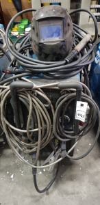 1 X MILLER MIGMATIC 380 BASE MIG WELDER - COMES WITH ALL CABLES , RUNNING GEAR , CYLINDER RACK , ALL GAS HOSES ,GAUGES AND A WELDERS MASK ( SN , MC232221D)