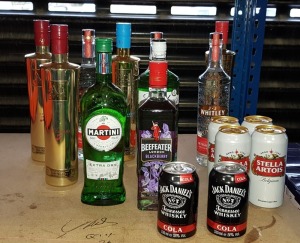 10 X BOTTLES OF ALCOHOL IE. AU VODKA, GORDONS GIN, JJ WHITLEY ARTISAN VODKA, BEEFEATER GIN, MARTINI PLUS 4 X STELLA CANS & 2 X JD COLA MIX