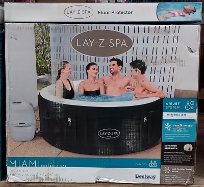 BRAND NEW BESTWAY MIAMI LAY-Z-SPA PORTABLE SPA 120 BUBBLE JET SYSTEM, FREEZE SHIELD & MULTI FUNCTIONAL PUMP - INFLATED SIZE 1.80 X 66 CM. ADDITIONAL ACCESSORIES : LAY-Z-SPA FLOOR PROTECTOR (NOTE: VAT NOT APPLICABLE ON THIS LOT)