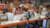 MISC LOT OF CONSUMABLE FOOD PACKAGING ON 1 1/2 HELVES IE, PIZZA BOXES, PAPER COFFEE CUPS, SCOTCHBAN STRING SATCHEL BAGS, PLASTIC DRINKS CUPS, METAL CHIP BASKETS (1 PORTION), WOODEN STIRRERS, CORRUGATED CUP HOLDERS, DOILIES ETC