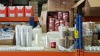 MISC LOT OF CONSUMABLE FOOD PACKAGING ON 1 1/2 HELVES IE, PIZZA BOXES, PAPER COFFEE CUPS, SCOTCHBAN STRING SATCHEL BAGS, PLASTIC DRINKS CUPS, METAL CHIP BASKETS (1 PORTION), WOODEN STIRRERS, CORRUGATED CUP HOLDERS, DOILIES ETC - 3