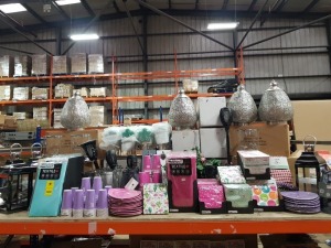 100+ PC BRAND NEW PREMIER GARDEN LOT ON A FULL SHELF IE. METAL LANTERS, SOLAR LANTERNS, PAPER NAPKIN, PLATES & CUP SETS, TEA TOWEL PACKS, HAPPY PAPER 1.4 X 2.2M TABLE COVERS, BEER BOTTLE OPENERS ETC.