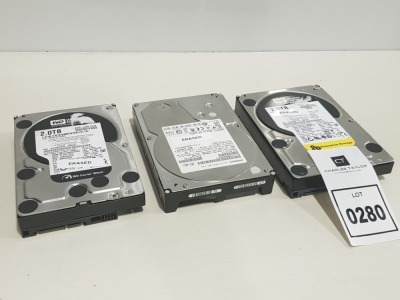 2 X WESTERN DIGITAL 2 TERABYTE HARD DRIVES ( MDL : WD2003FYYS-02W0B1 ) ( S/N WMAY00792254 ) 1 X HITACHI 2 TERABYTE HARD DRIVE ( S/N F3305T4D ) - NOTE ALL WIPED