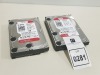 2 X WD HARD DRIVES - 3 TERABYTE ( S/N WMC4NOE7R21E ) ( S/N WCC4N1XHR5AL) - ALL DATA WIPED