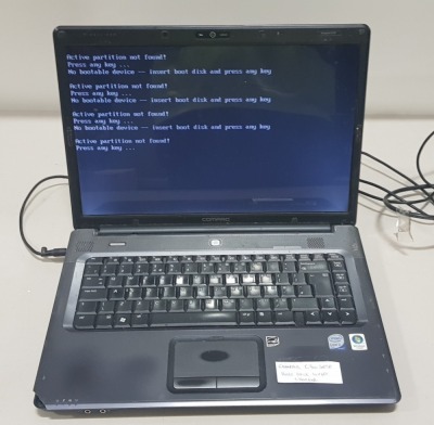 1 X COMPAQ C700 LAPTOP - HARD DRIVE WIPED - WITH CHARGER ( NOTE - HAS A CHIP ON LEFT CORNER OF KEYBOARD )