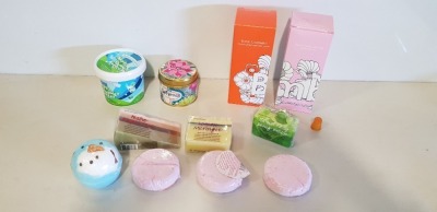 43 PIECE MIXED LOT TO CONTAIN VARIOUS BOMB PIPED CANDLES WITH ESSENTIAL OILS, BOMB COSMETICS TO INCLUDE MOJITO SHOWER BUTTER, GORGEOUS HI SWEETIE, CRAZY CUPID SOAP, VARIOUS SHOWER MIXERS, PASSIONFRUIT & SHEA HAND TREATMENT, TOP OF THE POPS SOAP, ETC