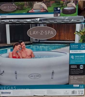 BRAND NEW BESTWAY VEGAS LAY-Z-SPA PORTABLE SPA
140 BUBBLE JET SYSTEM, FREEZE SHIELD & MULTI FUNCTIONAL PUMP - INFLATED SIZE 1.96 X 61 CM. 
ADDITIONAL ACCESSORIES : LAY-Z-SPA CANOPY & INTERLOCKING FLOOR PROTECTOR MAT (NOTE: VAT NOT APPLICABLE ON THIS LOT)