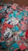 FULL PALLET OF PACKS OF 4 FABRIC FACE MASKS IN BLUE GREY PINK AND BLACK ALSO TO INCLUDE SOCKS GRIPS AND VARIOUS SWIMWEAR