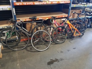 5 PIECE BIKE LOT CONTAINING VOODOO BIKE ( NOTE NO BACK WHEEL AND HANDLEBARS NOT FIXED ) , CARRERA FURY ( BACK WHEEL HAS MAJOR DAMAGE ) , APOLLO PINK MOUNTAIN BIKE , AND 2 X UNRANDED ROAD BIEKS WITH THIN TYRES - INCLUDES 1 SPARE FRONT WHEEL