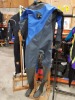 1 X TYPHOON RANGER SPORT DRY DIVING SUIT. COMES WITH WOODEN STAND