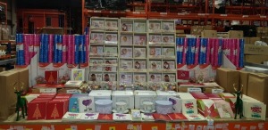 FULL BAY BRAND NEW MIXED LOT CONTAINING LARGE AMOUNT OF WOOLWORTHS WRAPPING PAPER, STAND OF MOSART FOR BABIES, THE QUEENS DIAMOND JUBILEE PLATES AND MUGS, LARGE AMOUNT OF 3D MUSICAL CARDS WITH ENVELOPES AND SPRUCE IT UP REINDEERS, MERRY CHRISTMAS CARDS, A