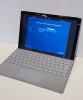 1 X MICROSOFT TABLET WITH KEY BOARD (DATA WIPED HAS CRACKED SCREEN )