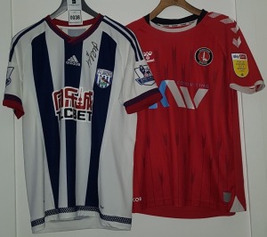 2 X SHORT SLEEVED FOOTBALL TOPS SIZE M IE. WEST BROMWICH ALBION - BERAHINO 18 & 17 UNKONWN SIGNATURES ON THE REVERSE (SEE IMAGES). BRAND: ADIDAS, SPONSORS: TLC BET, BARCLAYS PREMIER LEAGUE CHARLTON ATHLETIC - LEKO 18 ON THE REVERSE. BRAND: HUMMEL, SPONSOR