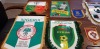 15 X ITEMS OF FOOTBALL MEMORABILIA IE. BURUNDI V MADAGASCAR / NIGERIA / ALGERIA PENDANTS, BAHRAIN / TANZANIA / FFRIM PENDANTS, PIN BADGES, KEYRINGS & PENDANTS RELATING TO U21 COMPETITION - 2