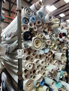 APPROX 150 PART ROLLS OF FABRICS IN ASSORTED COLOURS & DESIGNS (IN A FULL STILLAGE NOT INCLUDED)