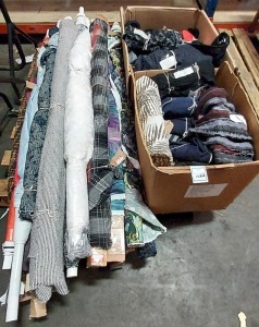 APPROX 22 ROLLS OF DESIGNER GARMENT FABRIC PART ROLLS PLUS 2 X BOXES OF VARIOUS DESIGNER FABRIC PART ENDS - ON A PALLET