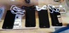 4 WORKING SMARTPHONES TO INCLUDE 3 X LG AND 1 ALCATEL - WITH CHARGING CABLES - NO POWER BRICK