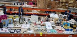 FULL BAY BRAND NEW MIXED LOT CONTAINING TABLET/ IPAD COVERS WITH STYLUS PEN , MINNIONS STORAGE METAL BOX , NOTEBOOK TIDY , VARIOUS BREW MUGS , METAL ROLLERBALL PENS , MINNIONS LUNCH BOX , BABY PILLOWS , VARIOUS TEDDY BEARS , VARIOUS PICTURE FRAMES , CHARA