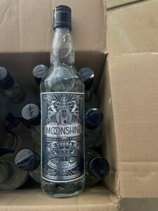 13 BOTTLES OF ALCOHOL IE. 12 X 70CL MOONSHINE VODKA PLUS 1 X RED WINE 2019 DOMAINE DES BOSENINS ***THESE ASSETS ARE LOCATED IN CROYDON AND WINNING BIDDER NEEDS TO COLLECT IN PERSON - THERE IS NO FACILITY TO PACK FOR ANY COURIER COLLECTIONS***