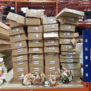 40 BRAND NEW BOXES FULL OF VARIOUS POLYESTER ARTIFICIAL FLOWERS to INCLUDE CANDLE RINGS IN BURGUNDY / CREAM RUST / WINE RED/ MAUVE COMBO / PEACH GREEN AND LILAC SPRAY IN BURGUNDY AND MAUVE